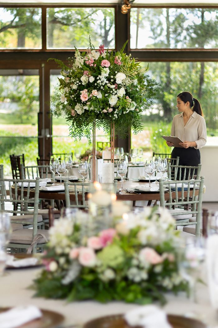 A vendor styling an event table